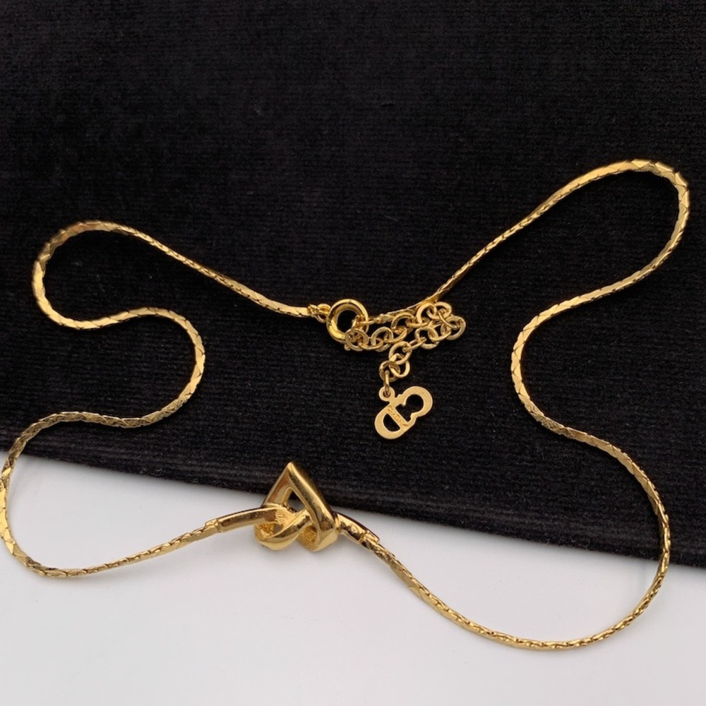 Dior x Swarovski 1980s 18k Yellow Gold Crystal Infinity Knotted Heart Necklace - Picture 6 of 11